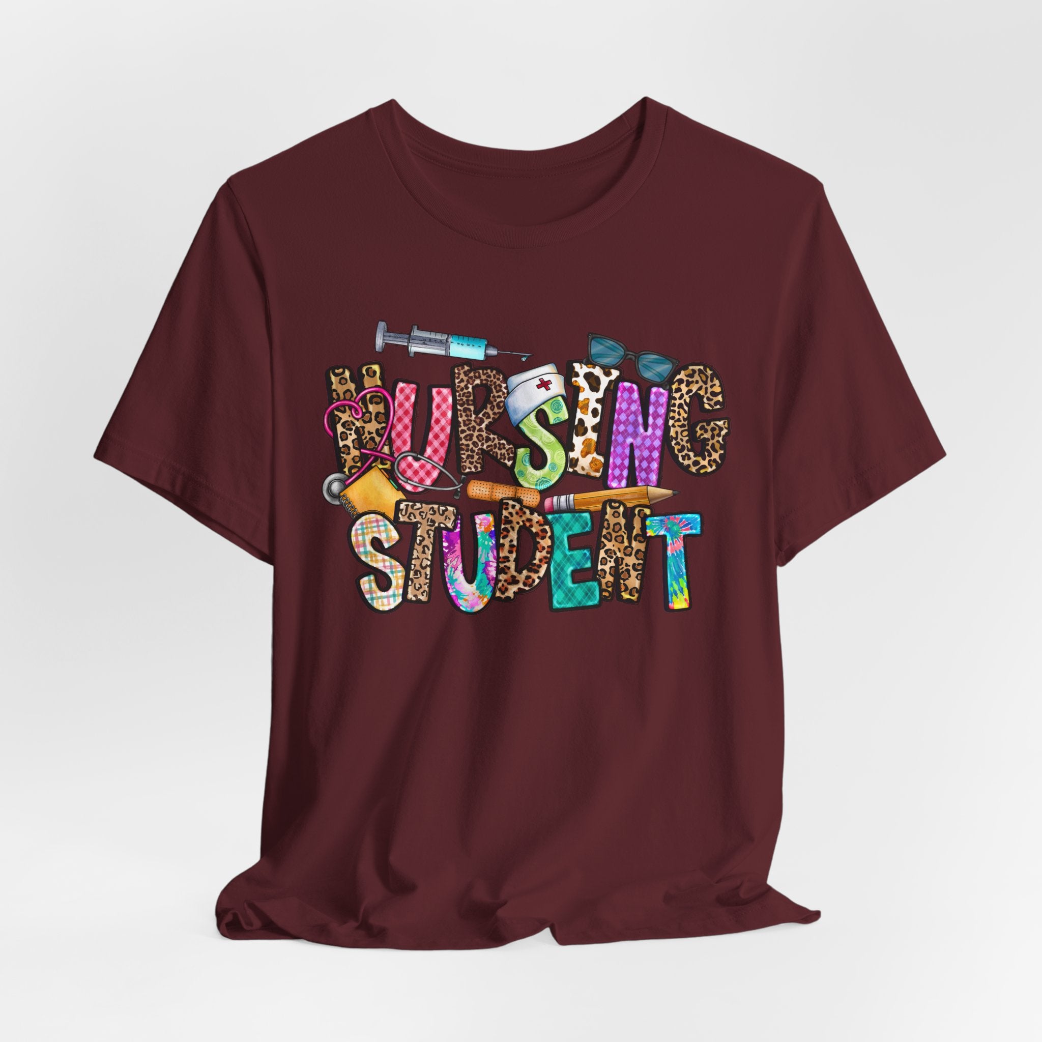 Nursing Student Graphic Tee — Colorful Medical Badge & Syringe Design