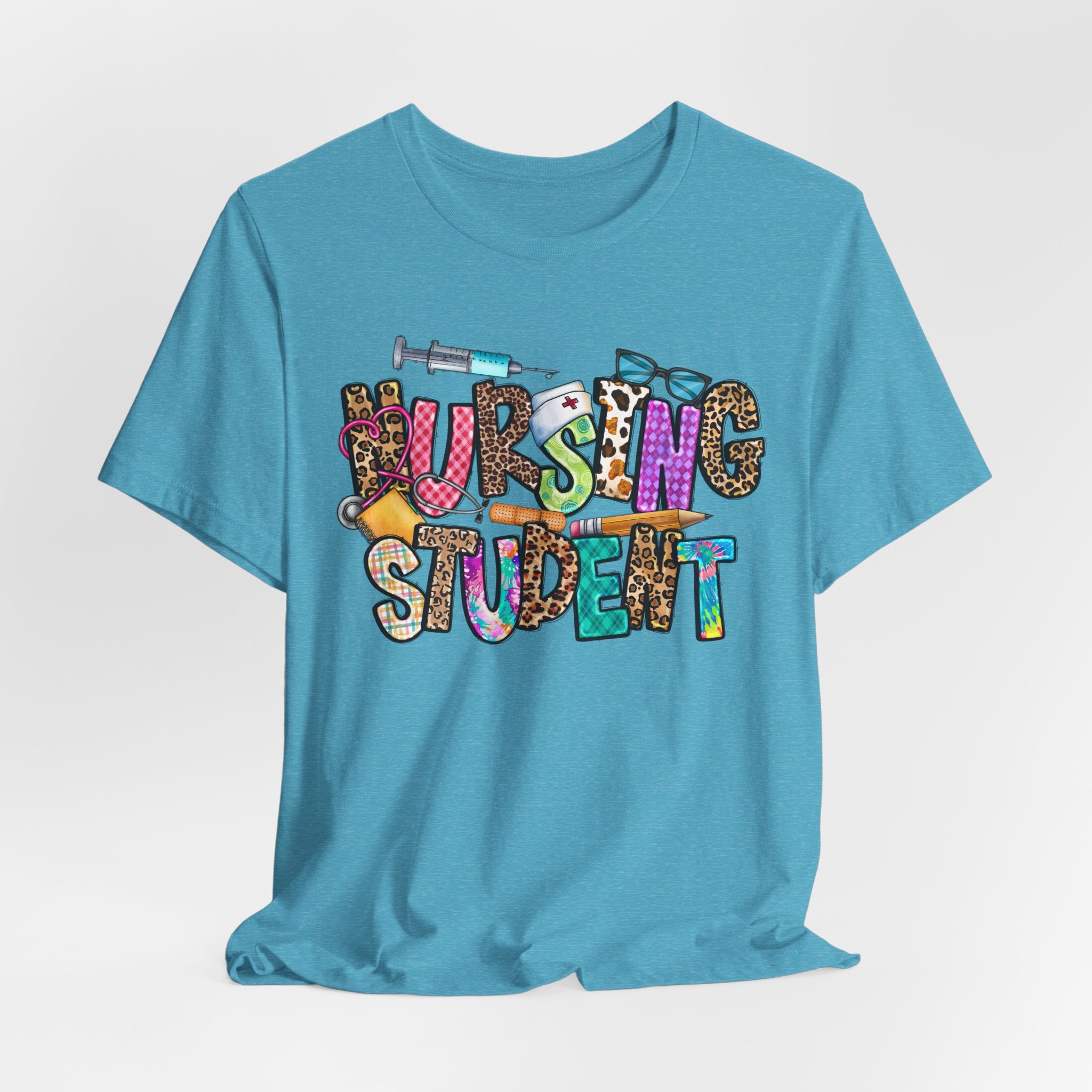 Nursing Student Graphic Tee — Colorful Medical Badge & Syringe Design